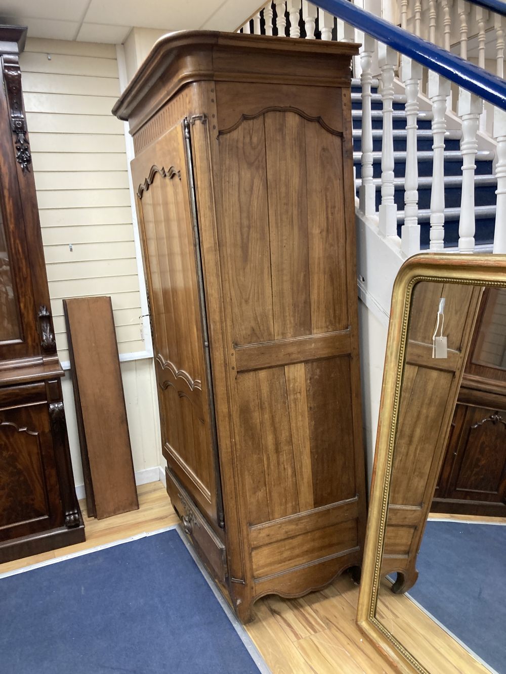 A French 18th century fruitwood single door armoire, width 120cm depth 70cm height 220cm
